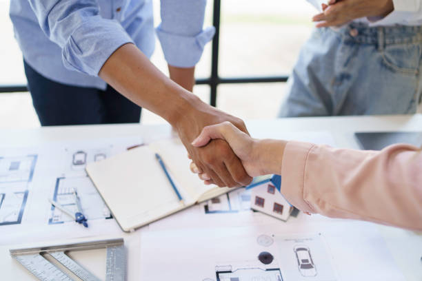 istock Architects and engineers work together and hand in hand to work towards the same goal and work together as a team for the success of the project. 1847832420
