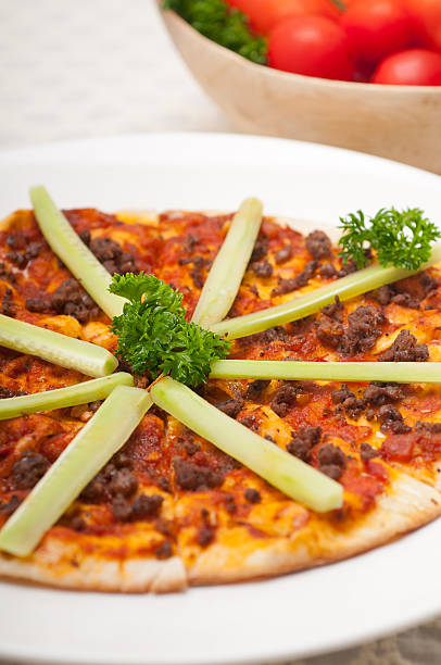istock Turkish beef pizza with cucumber on top 184783510