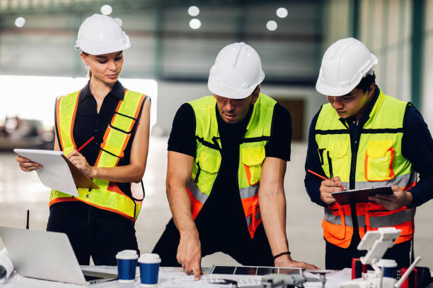 istock Warehouse worker working in warehouse storage. Foreman or worker work at factory site check up products in site. Inventory worker working in factory Storehouse 1847840883