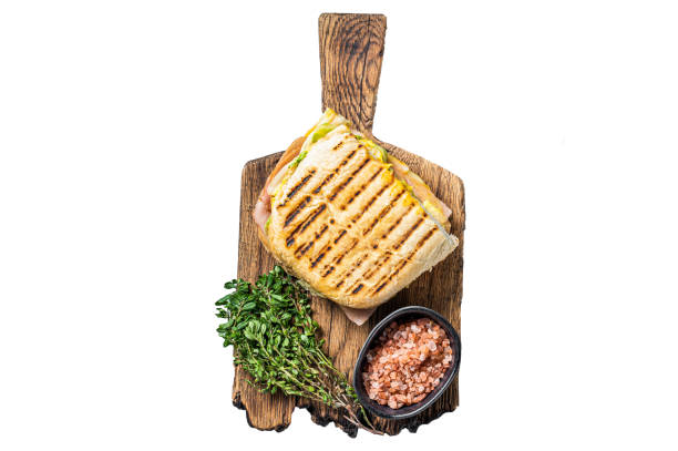 toasted panini sandwich with prosciutto ham and cheese. isolated, white background. - mozzarella tomato sandwich picnic imagens e fotografias de stock