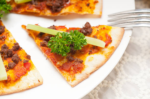 istock Turkish beef pizza with cucumber on top 184786584