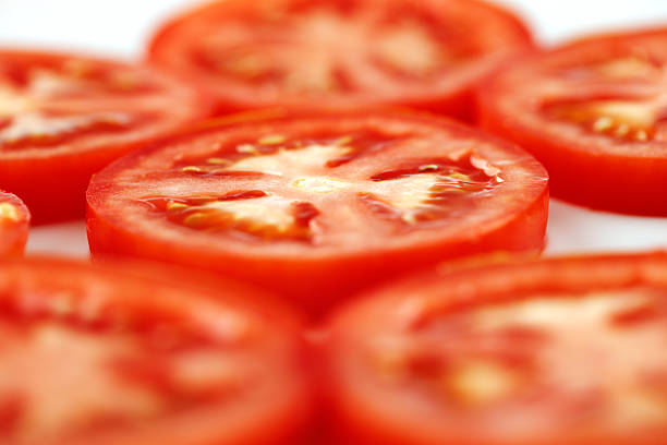 istock Few slices of organic vine tomatoes shot 184786604