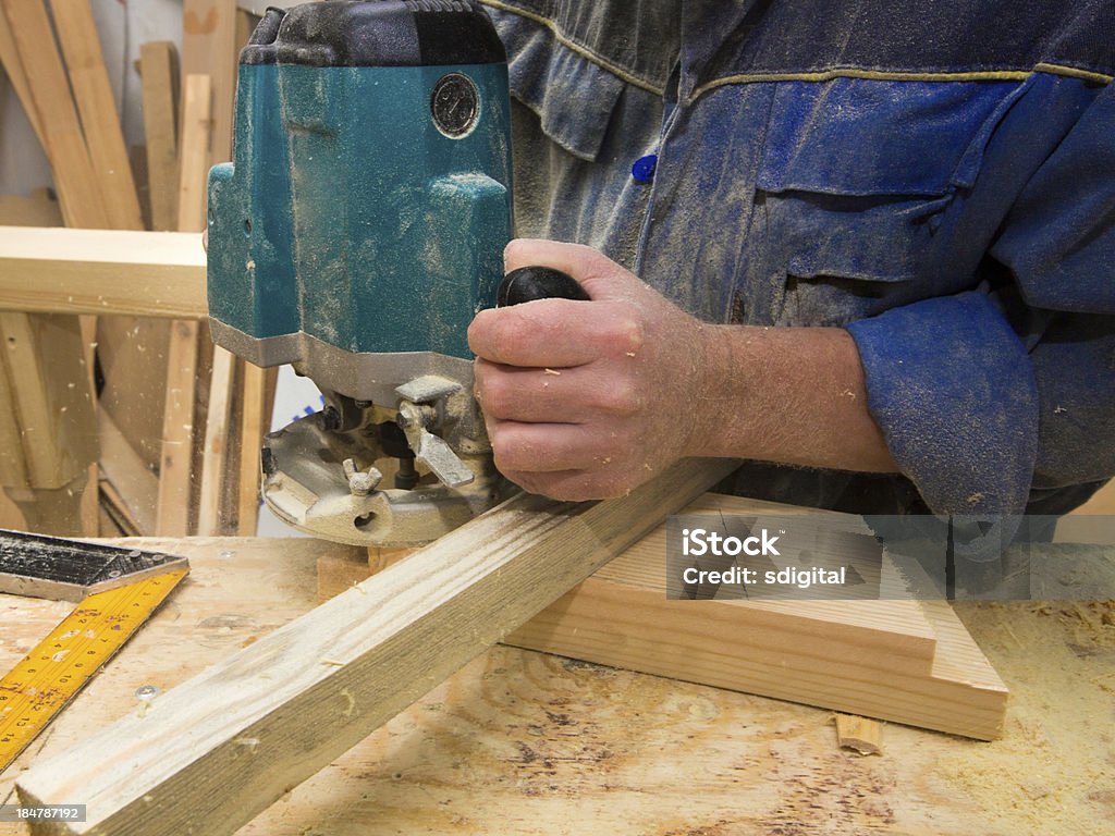 Guy Using A Router Man Using Router On Plank Of Wood Stock Photo - Download Image Now ...