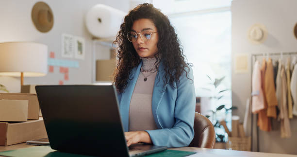 istock Boxes, internet and woman with a laptop, ecommerce and online order with website information, typing and startup. Person, entrepreneur and business owner with a pc, email notification and industry 1847897163