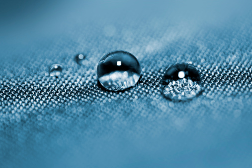 Effect with water drops on blue textile