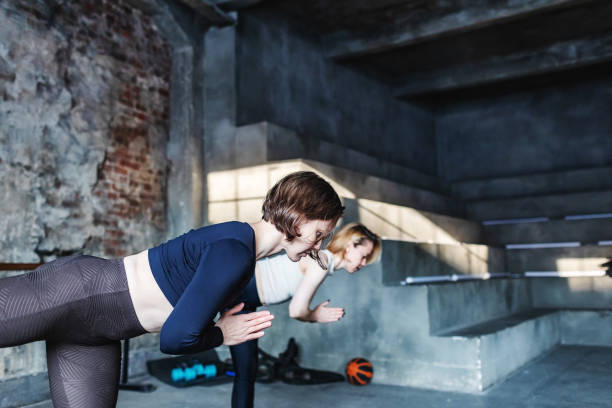 istock Yoga class, Half Moon, Ardha Chandrasana 1847900296
