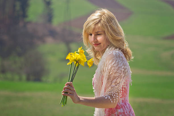 istock Woman and flowers 184790716