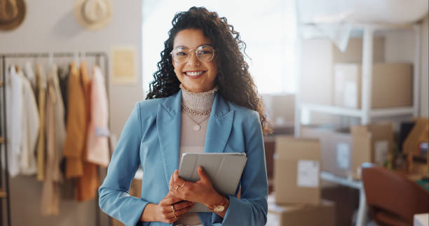 istock Portrait, boxes and woman with a tablet, ecommerce and smile with connection, internet and delivery. Face, person and employee with digital app, shipping or company website with online order and tech 1847922848