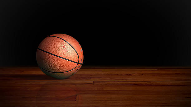 istock basketball on wood floor 184793112