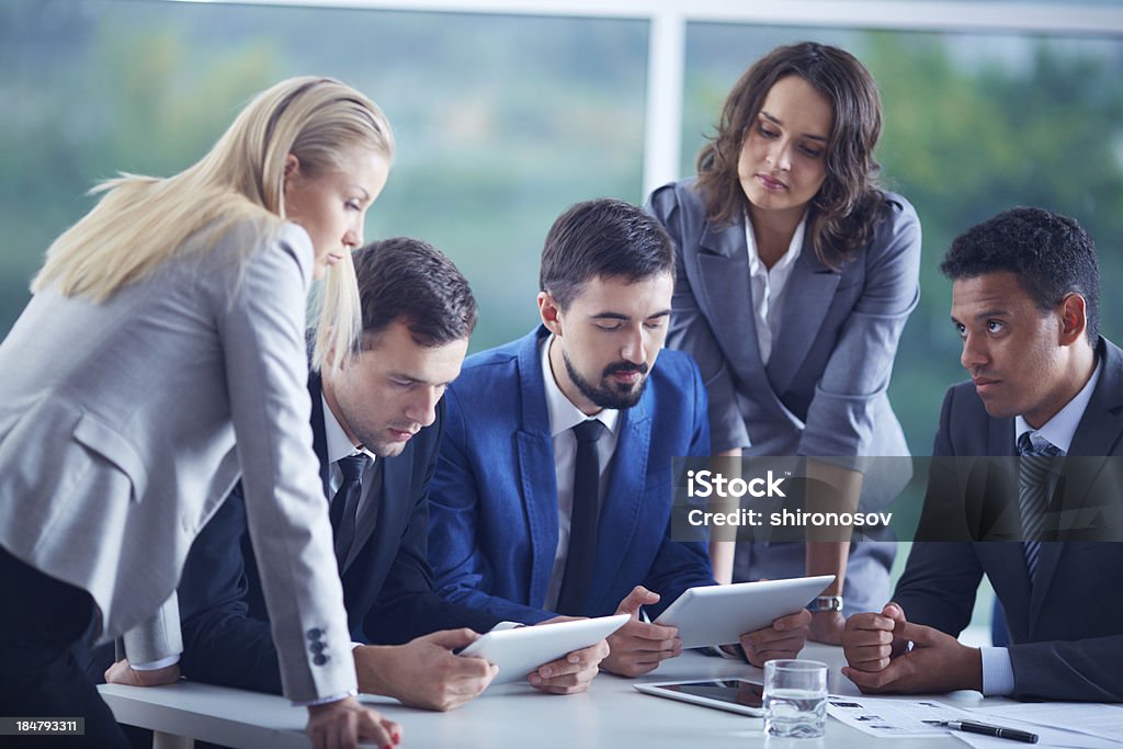 Business meeting Elegant business partners planning work at meeting Adult Stock Photo