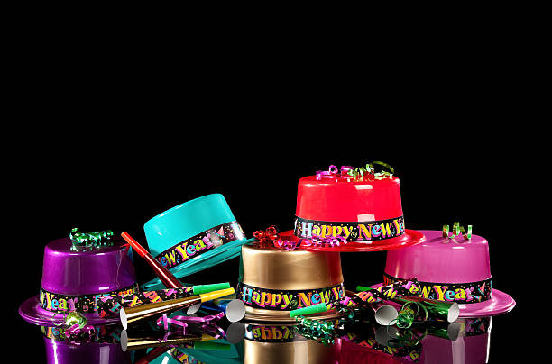 istock New Years' Eve party hats on  black background 184795221