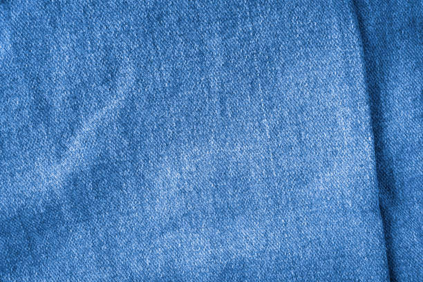 istock Texture of blue jeans textile close up 1847957039