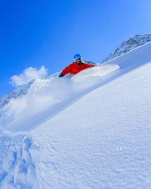freeride em pó de neve fresca - austria european alps winter outdoors - fotografias e filmes do acervo