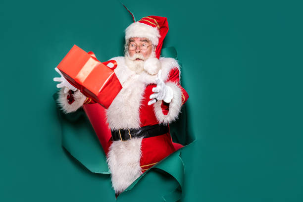 istock Funny Santa Claus with Christmas gift. 1847961779