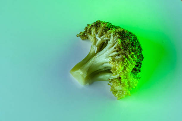 istock Broccoli illuminated with green vivid lighting 1847969528