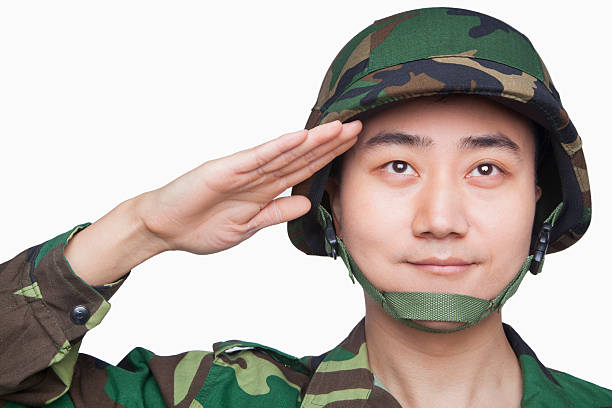 istock Man in military uniform saluting 184799019