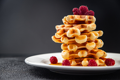 sweet waffles delicious dessert Belgian waffles healthy eating cooking appetizer meal food snack on the table copy space food background rustic top view