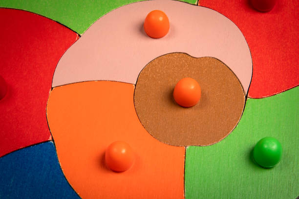 istock Colorful wooden puzzle. Logical thinking. Intelligent, brain training game 1848020265