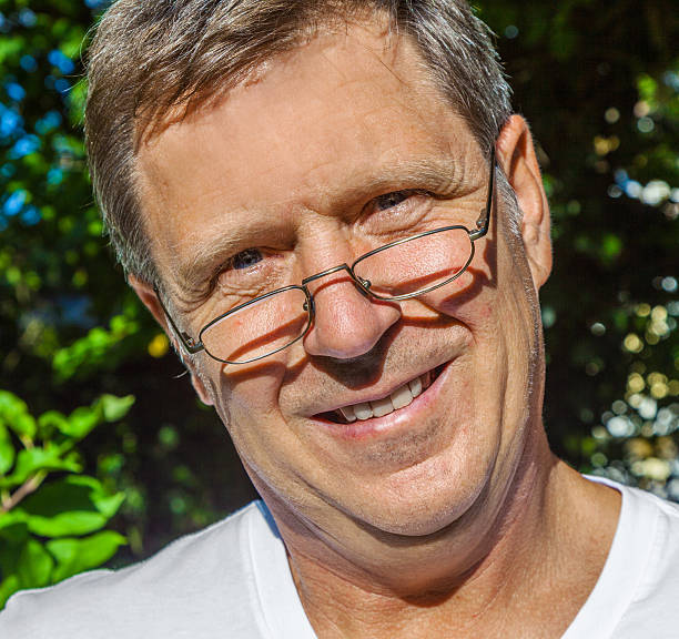 istock happy attractive man in the garden 184802093