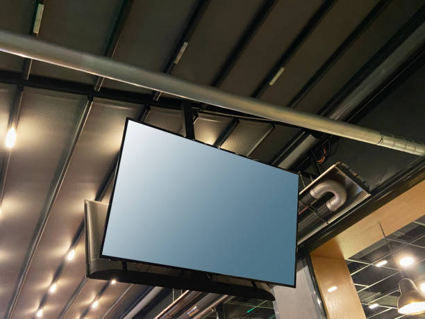 istock TV, lcd screen television hanging on pub or restaurant ceiling (Screen has clipping path) 1848029258