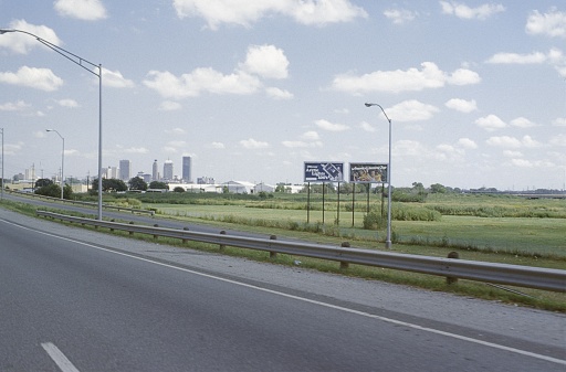 USA (unfortunately the exact location is not known), 1978. Highway in front of a large city in the United States.