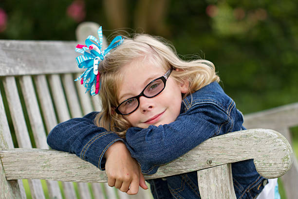 Cute blonde child looking at the camera