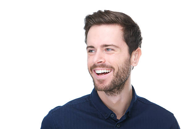 istock Handsome young man smiling on isolated white background 184807661