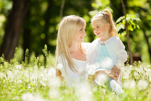 istock Mother and daughter in the park 184807891