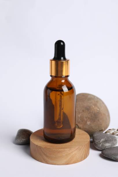 istock Composition with bottle of cosmetic serum on white background 1848089265