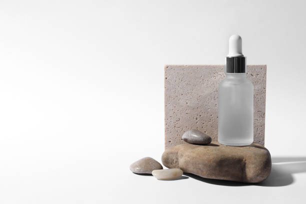 istock Composition with bottle of cosmetic serum on white background. Space for text 1848090332