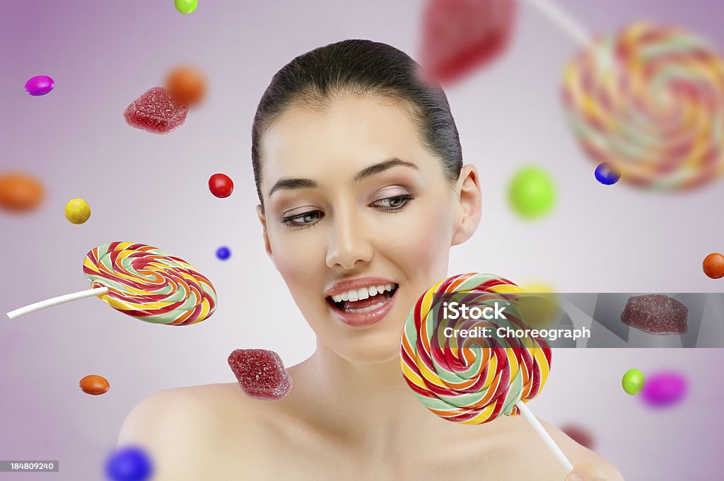 candy bar beautiful girl eats a candy bar Adult Stock Photo
