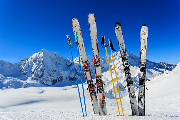 Ski equipments on snow Skiing, winter season , mountains and ski equipments in mountains winter sport stock pictures, royalty-free photos & images