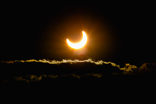 Solar Eclipse Marvel: Capturing the Astounding Phenomenon, Sun Fading Against a Dark Canvas