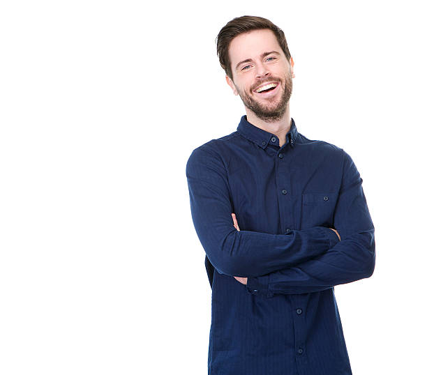 istock Young man smiling with arms crossed on white background 184815670
