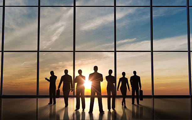istock The business team silhouettes 184817857