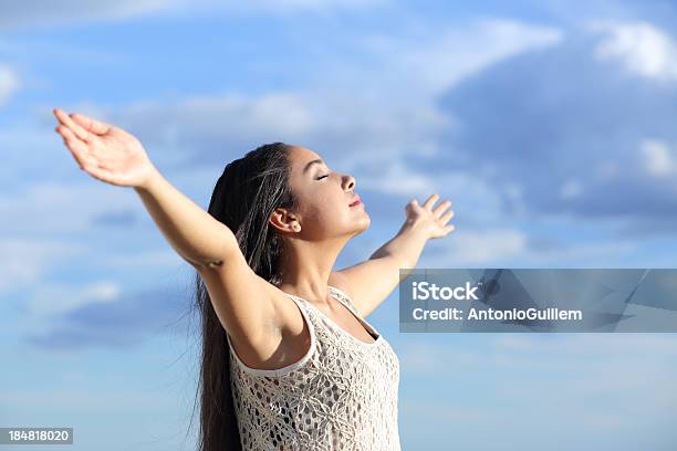 Beautiful Arab Woman Breathing Fresh Air With Raised Arms Stock Photo - Download Image Now