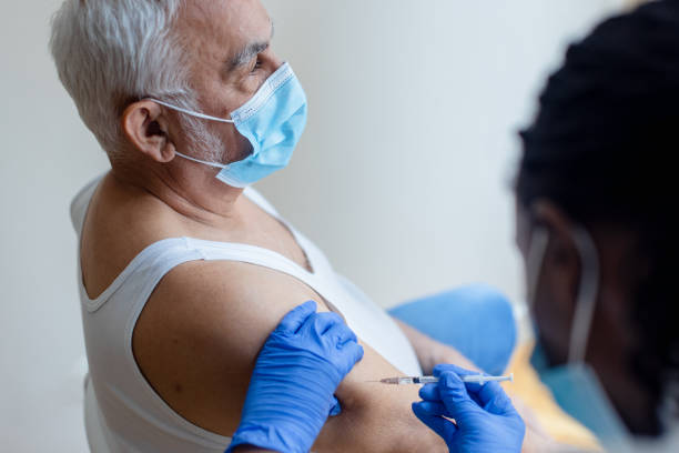 istock Vaccination of an senior male 1848204739