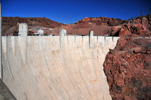 Hoover Dam, Clark County, Nevada, USA: concrete arch gravity dam in the Colorado River forming lake Mead - spillway and dam crest - photo by M.Torres