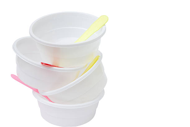 istock Plastic cups and spoons isolated on white background 184821798
