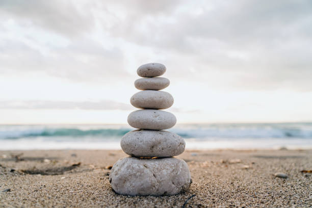 istock Zen Stones Balanced on a Peaceful Beach at Dawn 1848221950