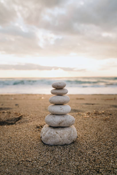 istock Zen Stones Balanced on a Peaceful Beach at Dawn 1848221955