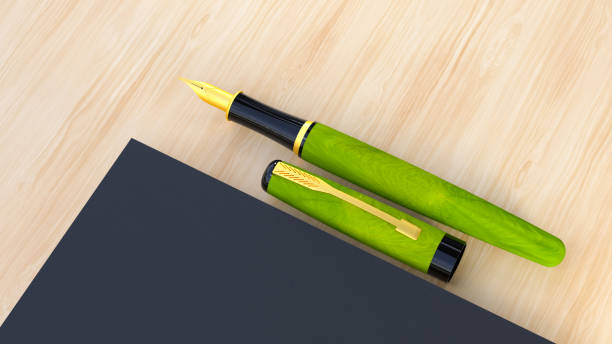 istock Fountain pen and note on wooden desk. 1848229291