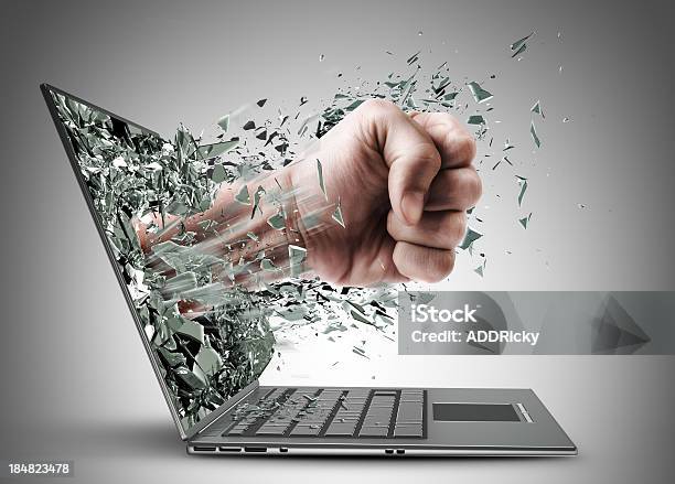 Fist From Laptop Stock Photo - Download Image Now - Laptop, Punching, Computer