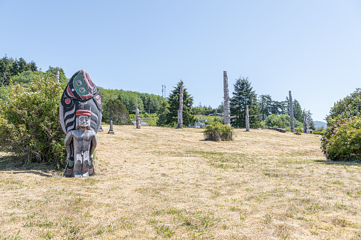 Ceremonial Totem Poles in the Namgis Burial Grounds in Alert Bay, British Columbia, Canada