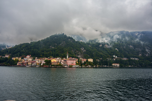 Town of Varenna in Lombardy, Lake Como Region of Northern Italy on a Cloudy Day, View from Lake