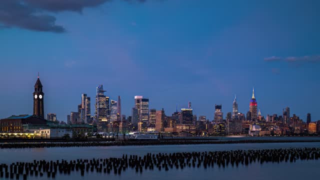 Magical transformation of a serene Hoboken pier and midtown Manhattan from day to night