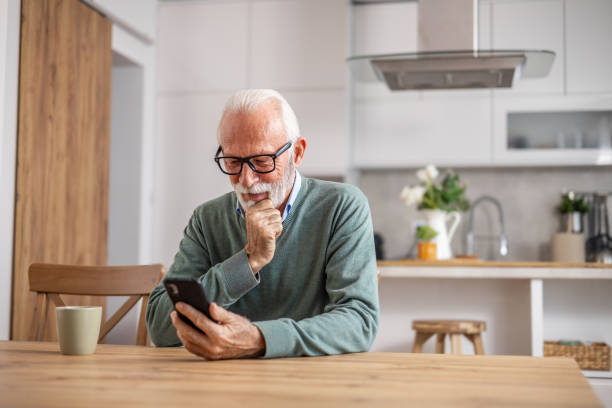 istock Senior man, pensioner, drinking morning coffee 1848316574