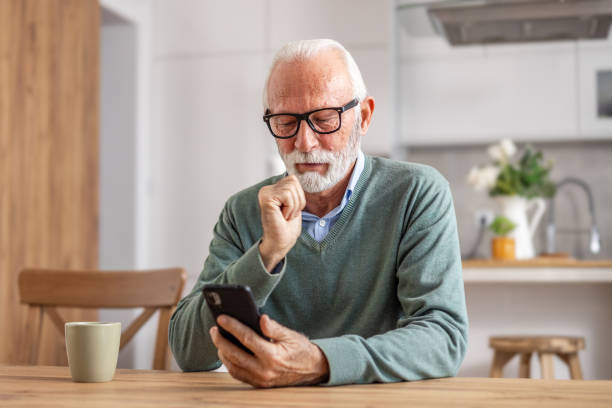 istock Senior man, pensioner, drinking morning coffee 1848316575