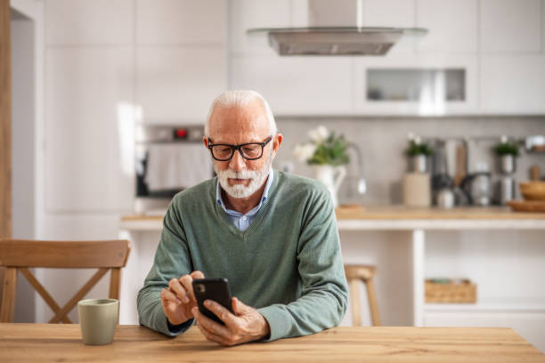 istock Senior man, pensioner, drinking morning coffee 1848316578