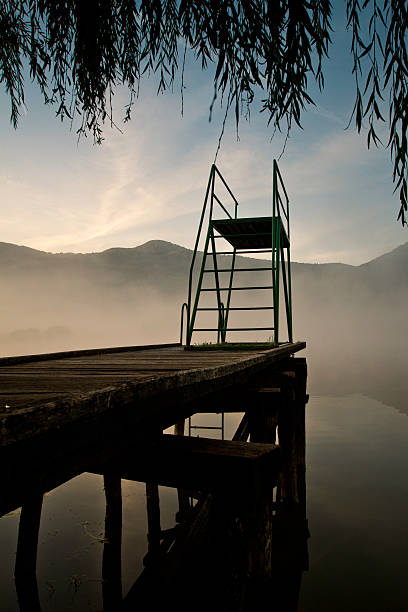 Morning mist on lake stock photo